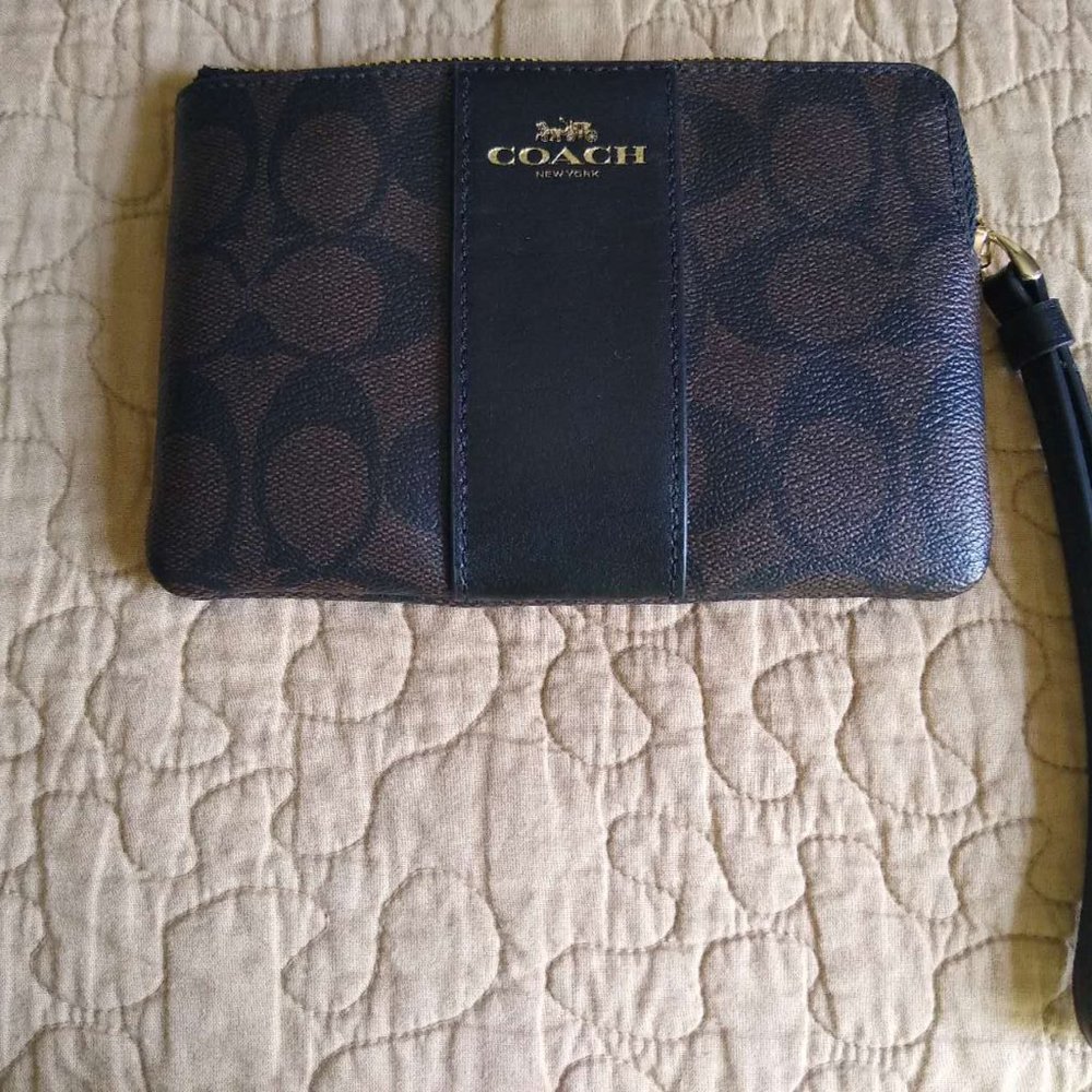 Coach Corner Zip Wristlet In Signature Canvas